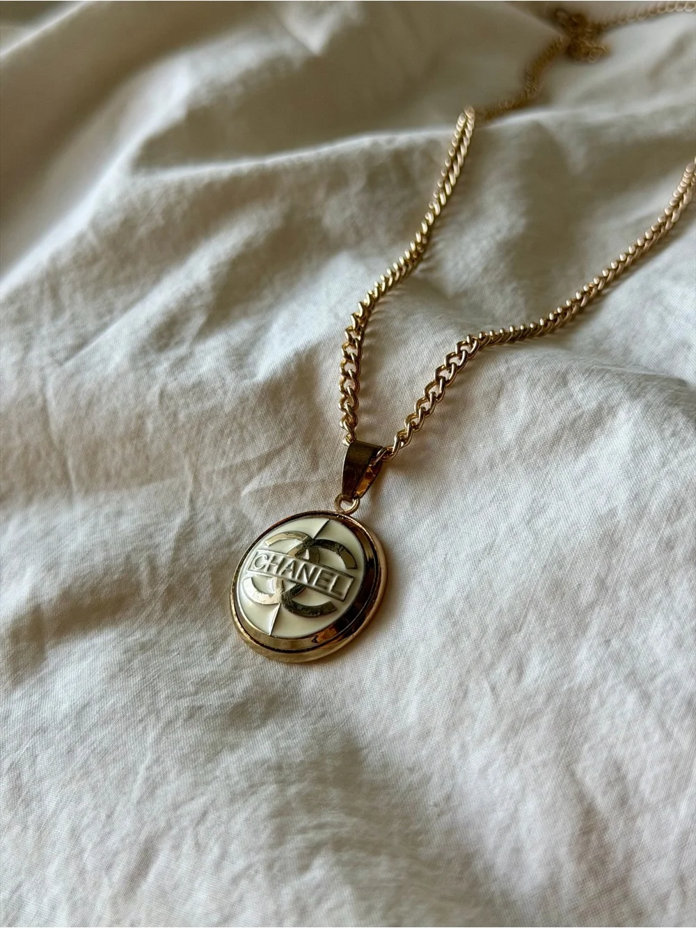 CHANEL Gold-tone Pendant Necklace with Cream Enamel CC Logo
